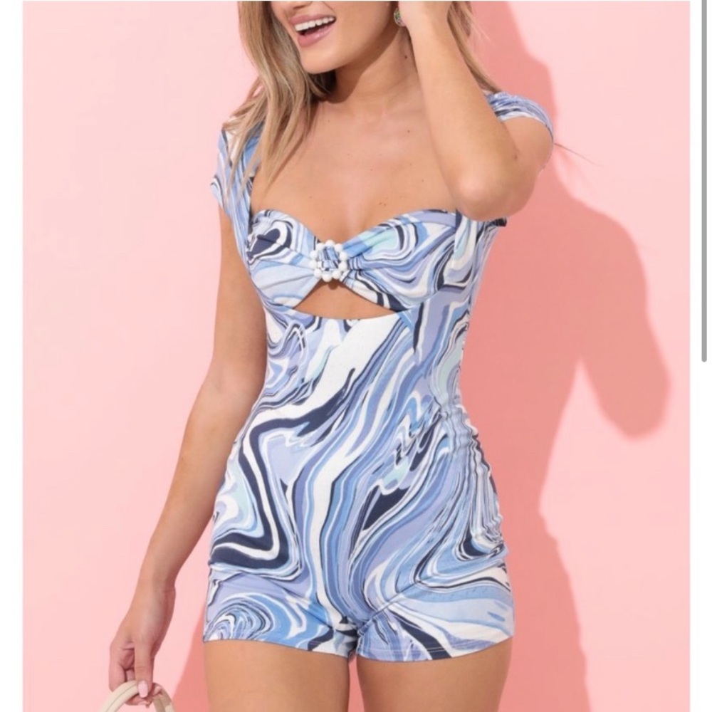 COPY - Lucy in the sky Brodie cutout romper in blue swirl